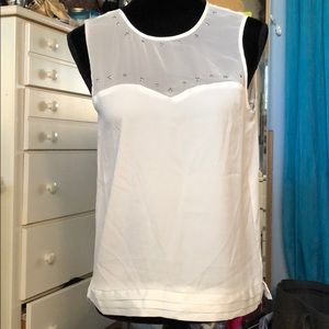 White sleeveless top with studs